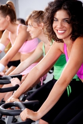 Women Spinning At Gym By Photostock